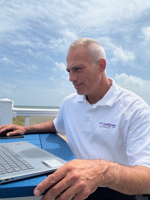 Mo Magic working on CodeBreeze Solutions projects